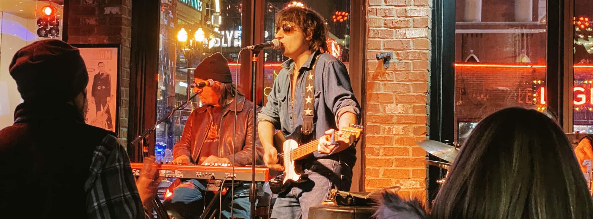bar singer on guitar in Missoula