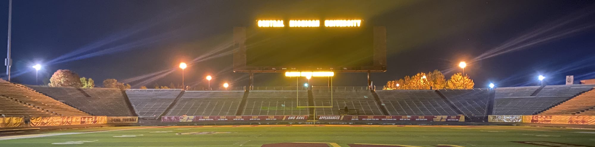 empty football stadium at night under the lights Missoula